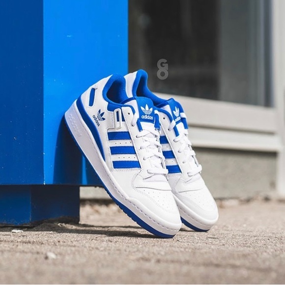 white and blue adidas originals